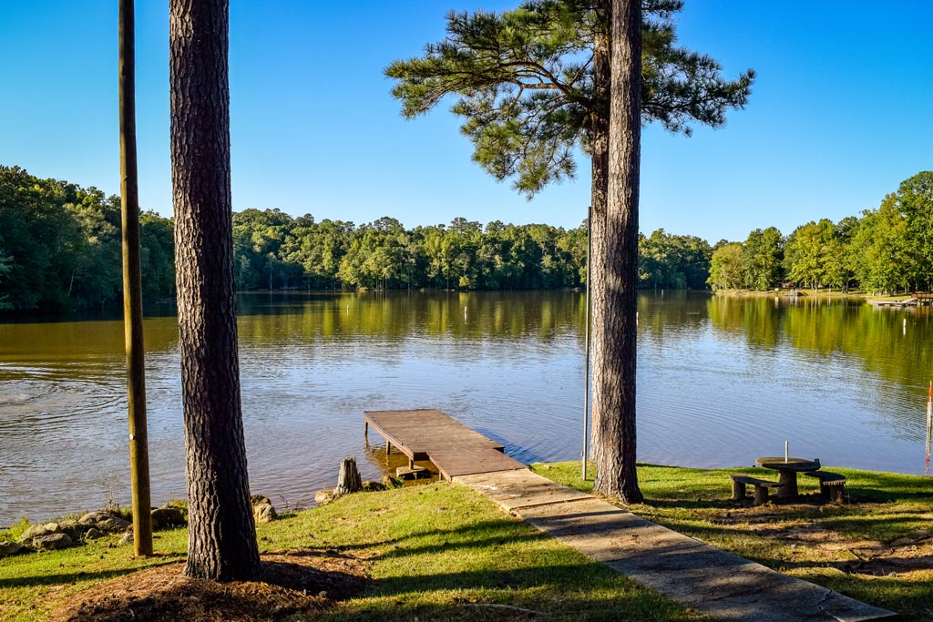 Fixed dock reaching the Jackson Lake water level at Bear Creek Marina in Mansfield, Georgia